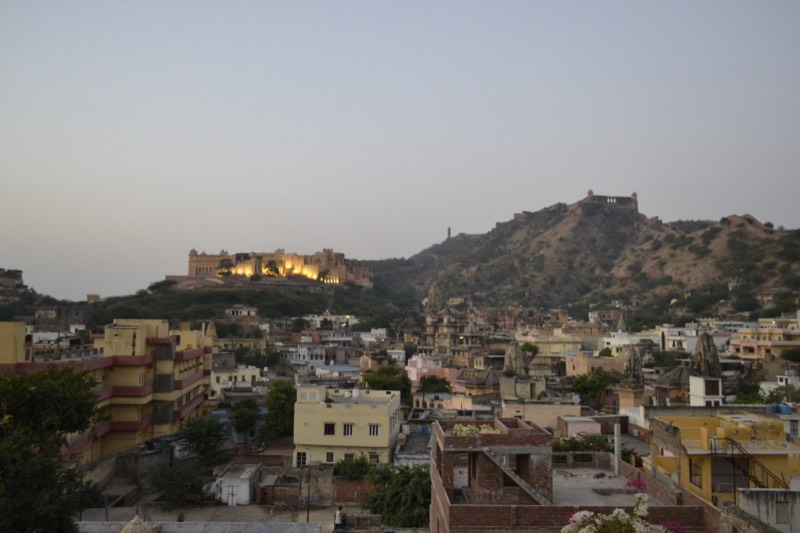 A hilltop fort overlooking the old town at dusk