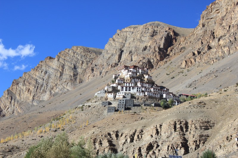 A monastery stacked on a hillside high above the valley floor