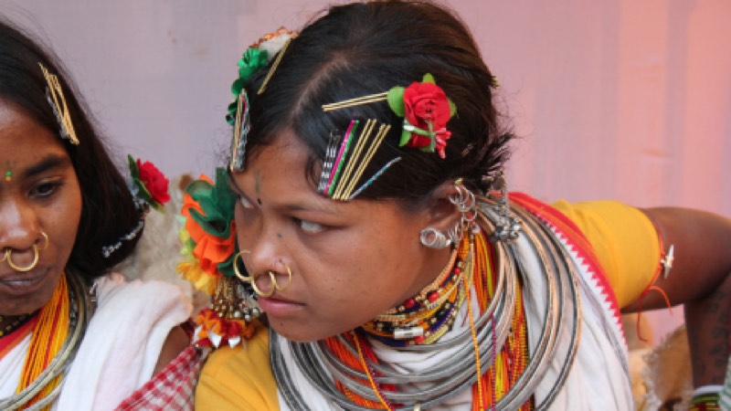 A woman in traditional tribal jewellery, photographed on a Route On Wheels journey
